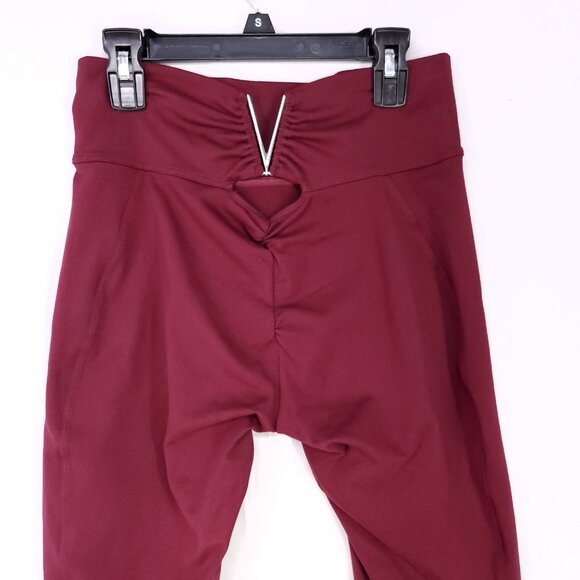 Bombshell Sportswear Leggings Size Small Cut Out Low Back Buckle Burgundy - Picture 3 of 13